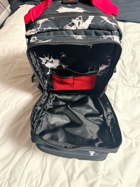 WOLF Black Backpack with Red Accents and White Marble Print